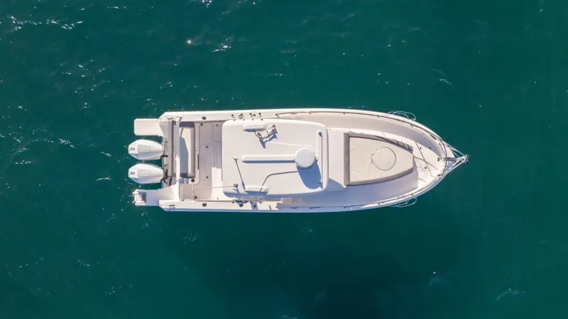 Slide: The Image of Aerial view of 2025 SeaWell 290XL boat on clear blue water. - 12