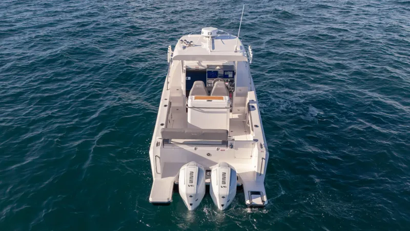 Slide: The Image of Aerial view of 2025 SeaWell 290XL boat cruising on open water. - 14