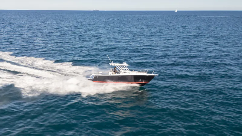 Slide: The Image of 2025 SeaWell 290XL boat cruising on open ocean waters. - 20