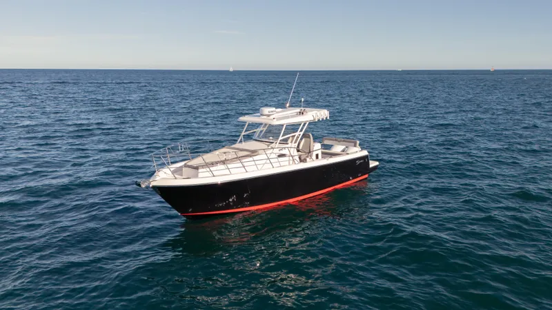 Slide: The Image of 2025 SeaWell 290XL boat on open ocean, clear sky, calm waters. - 3