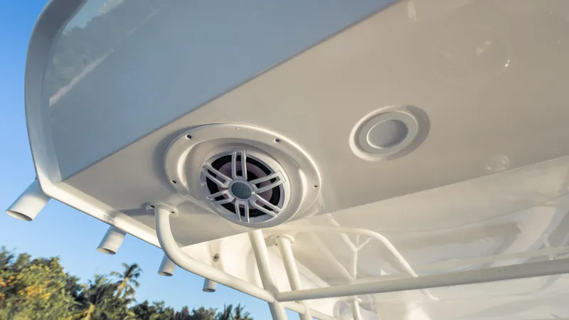 Slide: The Image of 2025 SeaWell 290XL boat speaker and canopy detail against a clear sky. - 37