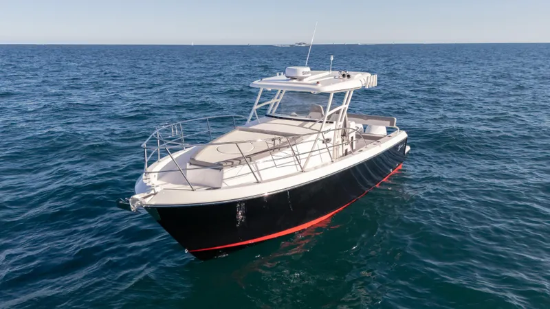 Slide: The Image of Modern SeaWell 290XL boat cruising on open sea, 2025 model. - 6