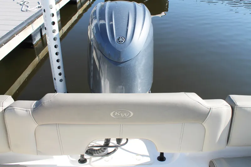 Slide: The Image of 2024 Key West 203 FS boat with Yamaha outboard engine at dock. - 17