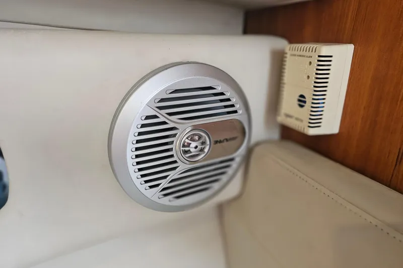 Slide: The Image of Speaker and alarm system inside 2001 Pursuit 3000 Express boat cabin. - 42