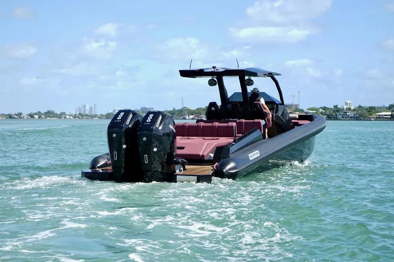 Slide: The Image of 2024 Skipper 42 boat cruising on a sunny day with dual engines. - 25