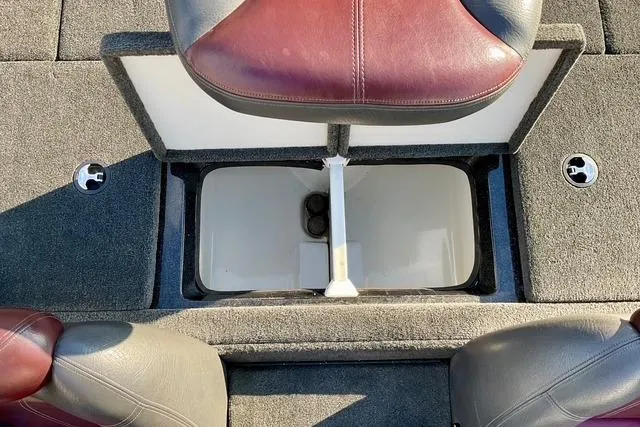 Slide: The Image of 2008 Ranger 188 VX boat interior with storage compartment and seating. - 11