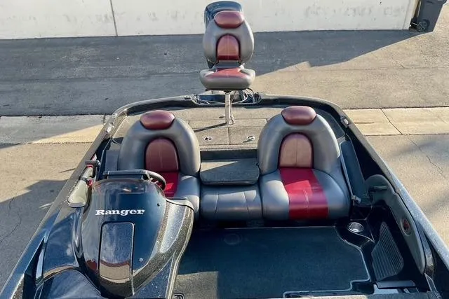 Slide: The Image of 2008 Ranger 188 VX boat interior with red and black seating, top view. - 15