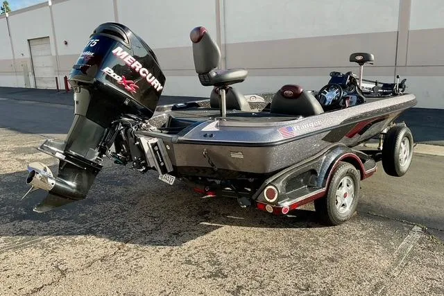 Slide: The Image of 2008 Ranger 188 VX boat with Mercury Pro XS engine on a trailer. - 2