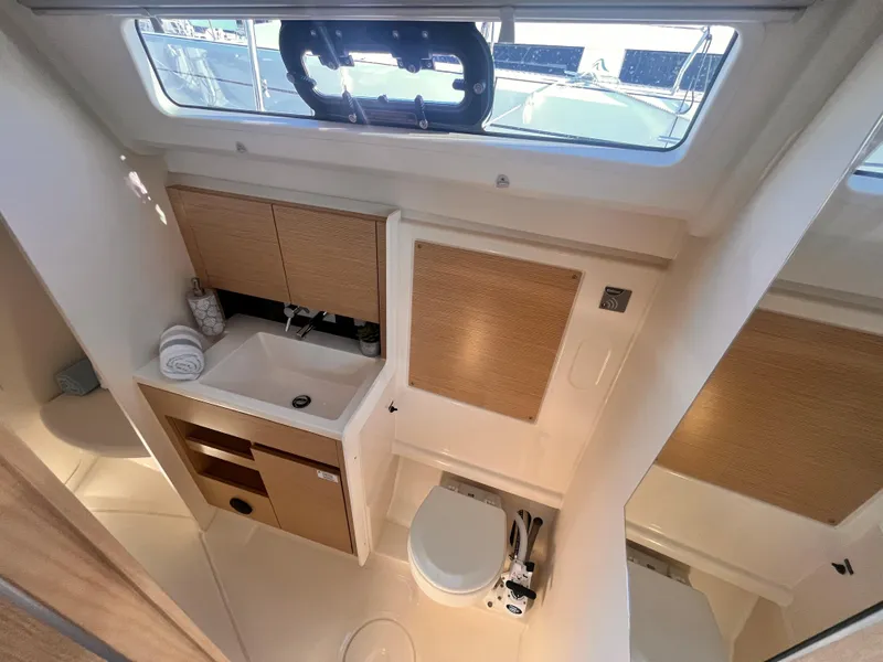 Slide: The Image of Modern bathroom interior of 2026 Hanse 348 yacht, featuring sink and toilet. - 23