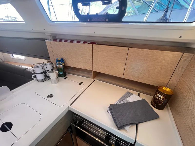 Slide: The Image of Modern kitchen interior of 2026 Hanse 348 yacht with sleek cabinetry and appliances. - 25