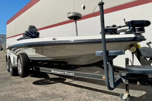 Slide: The Image of 2020 Ranger Z520L boat on trailer, parked outdoors, side view. - 22
