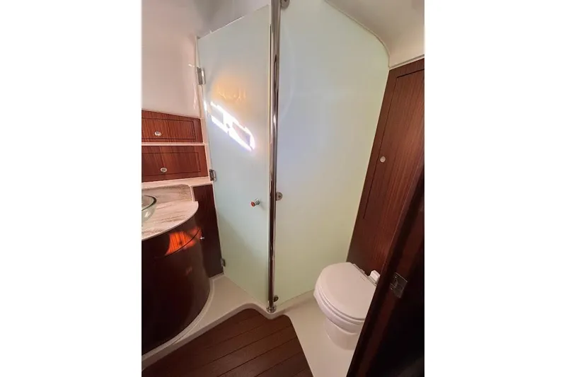 Slide: The Image of Luxurious bathroom in 2021 Pursuit OS 385 Offshore boat with modern fixtures. - 31