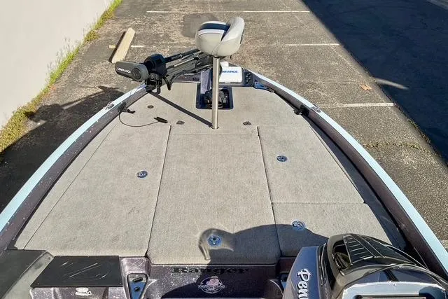 Slide: The Image of 2015 Ranger Z518 Comanche fishing boat with trolling motor and spacious deck. - 17