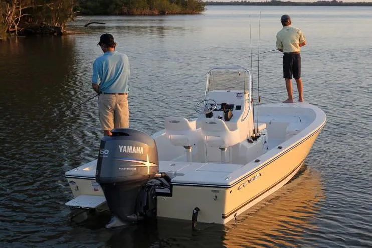 Slide: The Image of Manufacturer Provided Image: 2019 Cobia 21 Bay boat with Yamaha motor, two people fishing. - 6