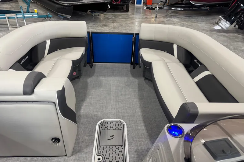 Slide: The Image of 2026 Sylvan X5 boat interior with gray and black seating, modern design. - 10