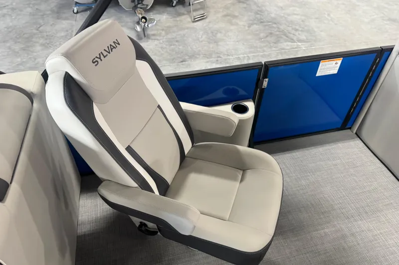 Slide: The Image of Luxurious Sylvan X5( 2026 boat seat with cup holder, gray upholstery, and sleek design. - 12