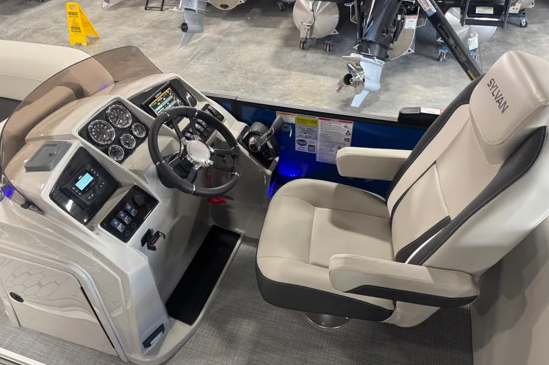 Slide: The Image of 2026 Sylvan X5 boat cockpit with modern steering and control panel. - 13