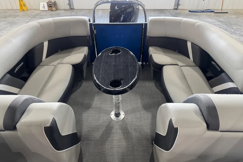 Slide: The Image of Luxurious interior of 2026 Sylvan X5( pontoon boat with plush seating and sleek table. - 14