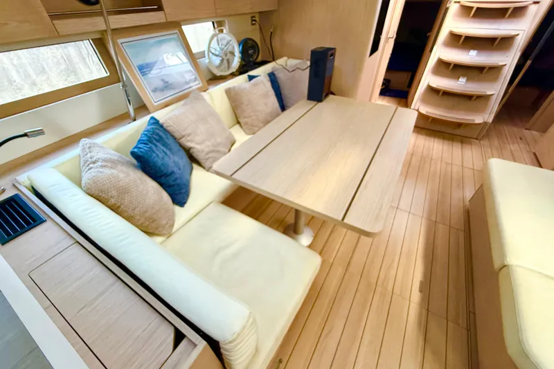 Slide: The Image of Luxurious interior of 2020 Beneteau Oceanis 51.1 yacht with cozy seating and elegant decor. - 39