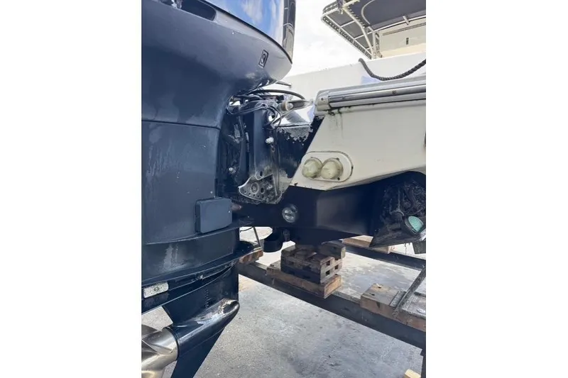 Slide: The Image of 2004 Fountain 31 Tournament Edition boat engine detail on wooden blocks. - 14