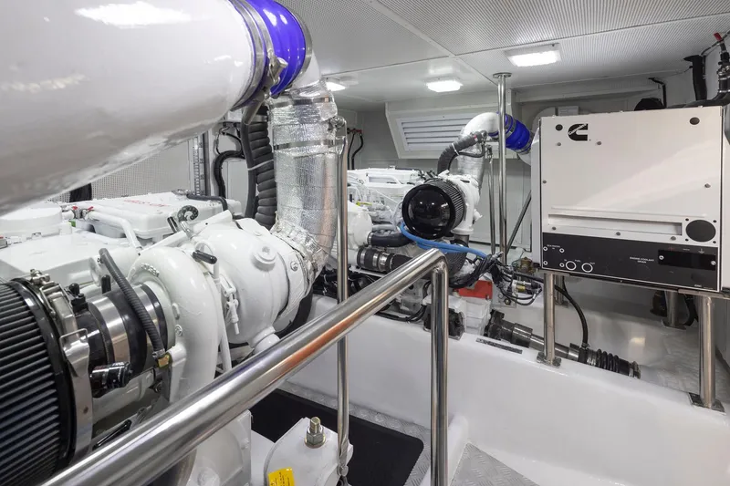 Slide: The Image of Engine room of 2025 Apollonian Yachts 52 Pilothouse, featuring advanced machinery and equipment. - 10