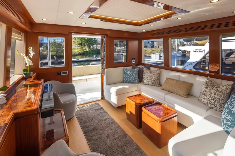 Slide: The Image of Luxurious interior of 2025 Apollonian Yachts 52 Pilothouse with elegant seating and wood accents. - 12