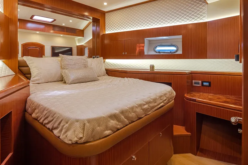 Slide: The Image of Luxurious cabin interior of 2025 Apollonian Yachts 52 Pilothouse with elegant wood finish. - 20