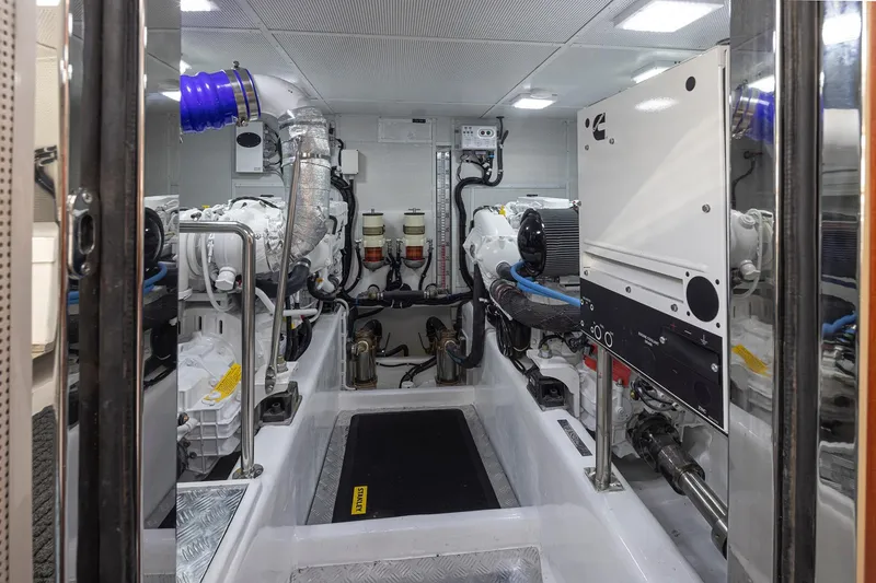 Slide: The Image of Engine room of 2025 Apollonian Yachts 52 Pilothouse, showcasing advanced marine machinery. - 9