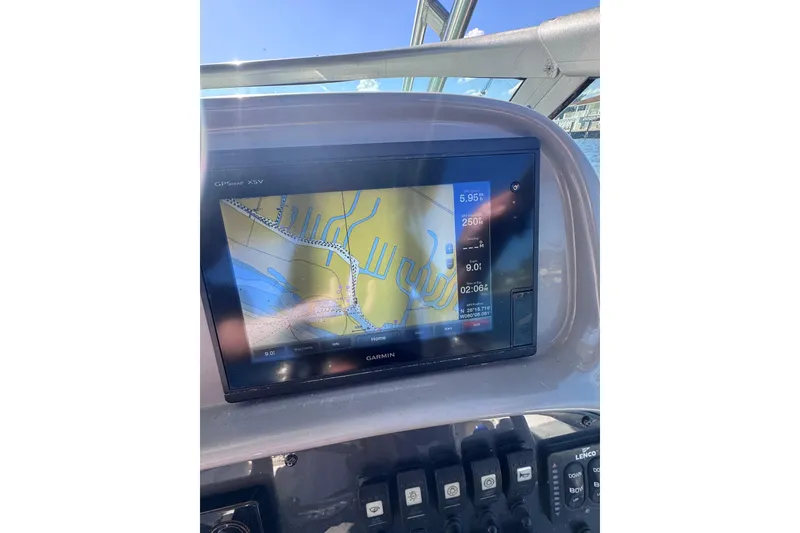 Slide: The Image of Garmin GPS display on 2014 Robalo R265 Walkaround boat dashboard. - 28
