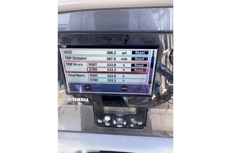 Slide: The Image of Yamaha display on 2014 Robalo R265 Walkaround showing trip data and engine hours. - 46