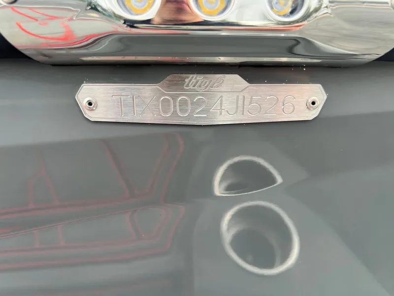 Slide: The Image of 2026 Tigé 24RZX boat identification plate with serial number TIX0024J526. - 13