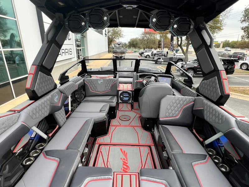 Slide: The Image of 2026 Tigé 24RZX boat interior with modern seating and advanced dashboard features. - 20