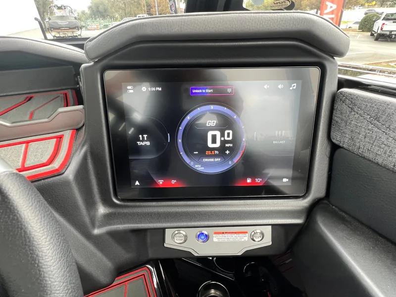 Slide: The Image of Dashboard of 2026 Tigé 24RZX boat with digital display and controls. - 35