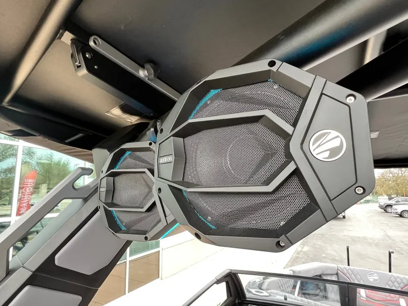 Slide: The Image of 2026 Tigé 24RZX boat speakers, black and blue design, mounted on a sleek frame. - 43