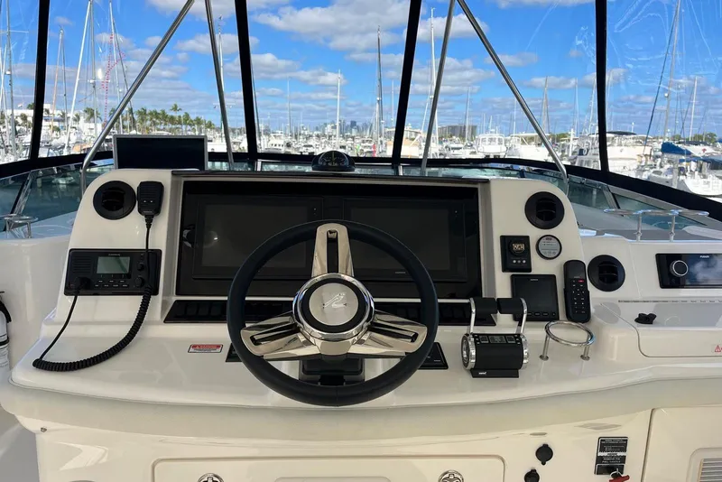 Slide: The Image of Helm of 2006 Sea Ray 52 Sedan Bridge with modern navigation equipment. - 16