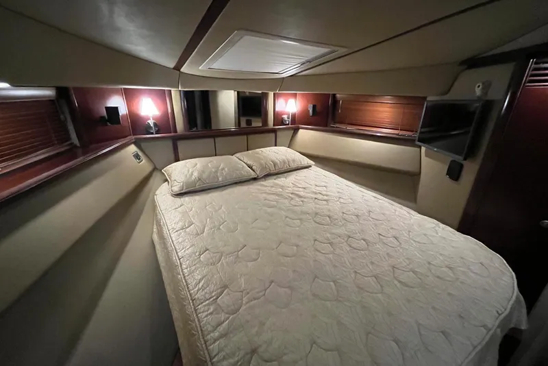 Slide: The Image of Luxurious bedroom interior of 2006 Sea Ray 52 Sedan Bridge yacht. - 43