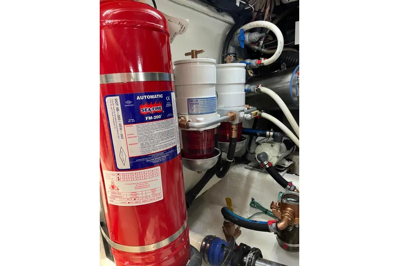 Slide: The Image of Engine room of 2006 Sea Ray 52 Sedan Bridge with fire suppression system. - 47