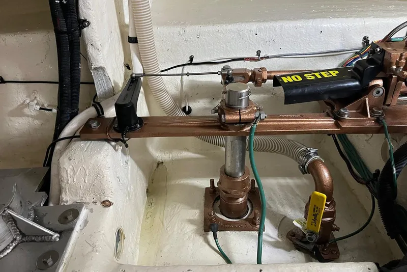 Slide: The Image of Engine room of 2006 Sea Ray 52 Sedan Bridge with visible mechanical components. - 60