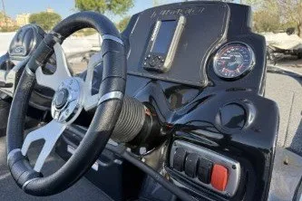 Slide: The Image of Steering console of a 2026 Nitro Z17 boat with modern controls and gauges. - 5
