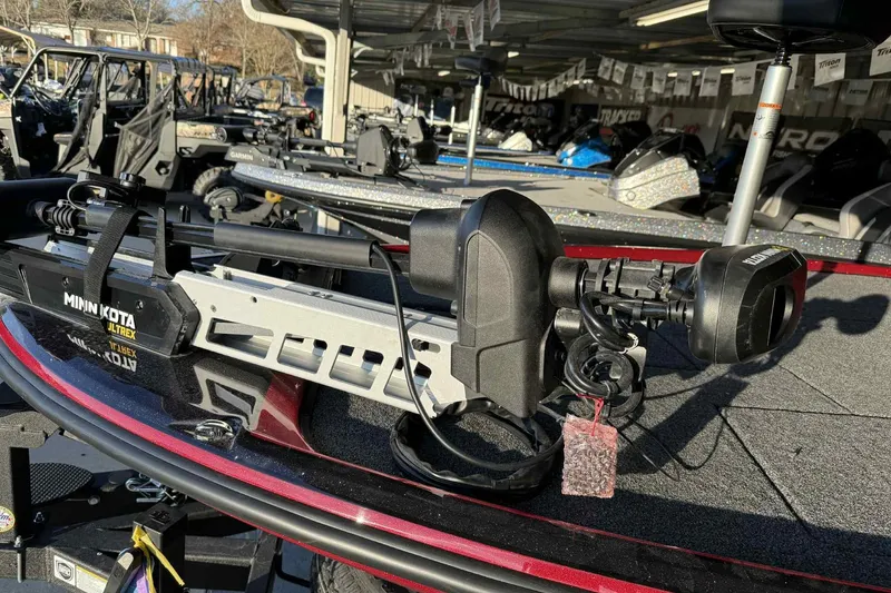 Slide: The Image of 2026 Nitro Z20 XL Pro boat with Minn Kota Ultrex motor in showroom. - 115