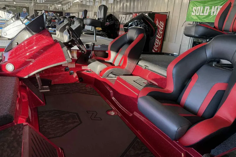 Slide: The Image of 2026 Nitro Z20 XL Pro boat interior with red and black seating, steering console. - 117