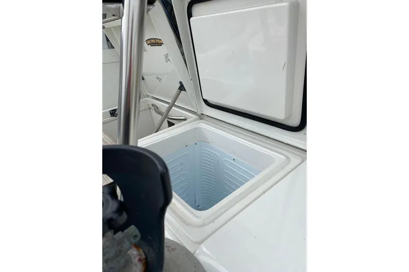 Slide: The Image of Open storage compartment on 1995 Hatteras 50 Convertible Sportfish boat. - 25