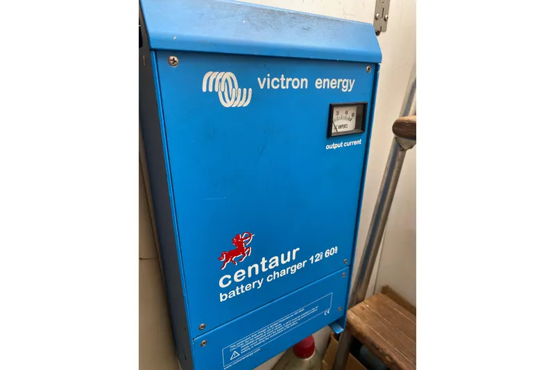 Slide: The Image of Blue Victron Energy Centaur battery charger on 1995 Hatteras 50 Convertible Sportfish. - 64