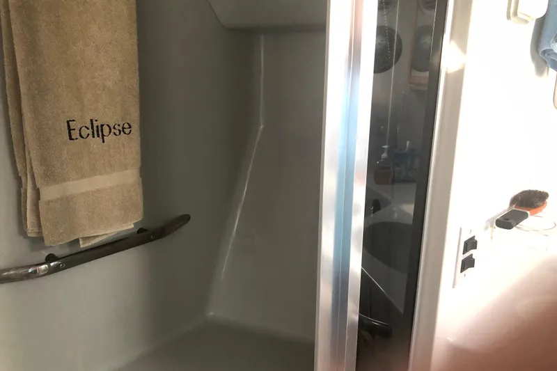 Slide: The Image of Shower area in 1990 Sea Ray 440 Express yacht with "Eclipse" towel. - 19