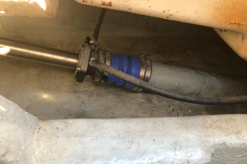 Slide: The Image of Close-up of a 1990 Sea Ray 440 Express boat shaft and coupling. - 33