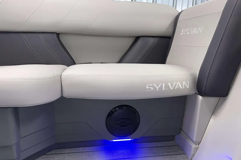 Slide: The Image of 2026 Sylvan Mirage 8520 CLZ DH boat interior with stylish seating and ambient lighting. - 17