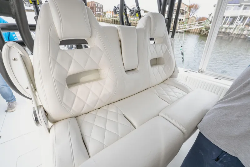 Slide: The Image of Luxurious white leather seating on a 2018 Freeman 37 VH boat interior. - 17