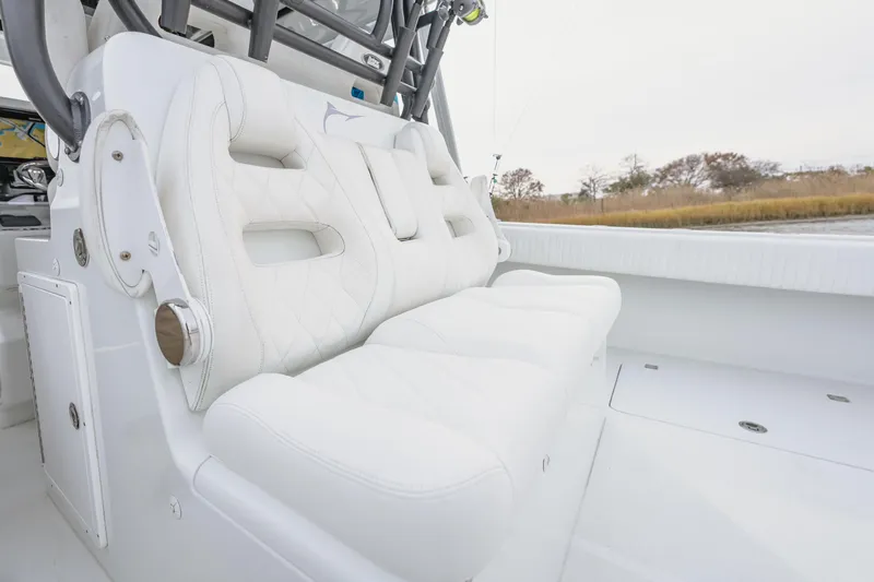 Slide: The Image of Luxurious white seating on a 2018 Freeman 37 VH boat, showcasing comfort and style. - 18