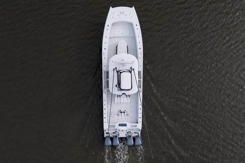 Slide: The Image of Aerial view of 2018 Freeman 37 VH boat cruising on water. - 2