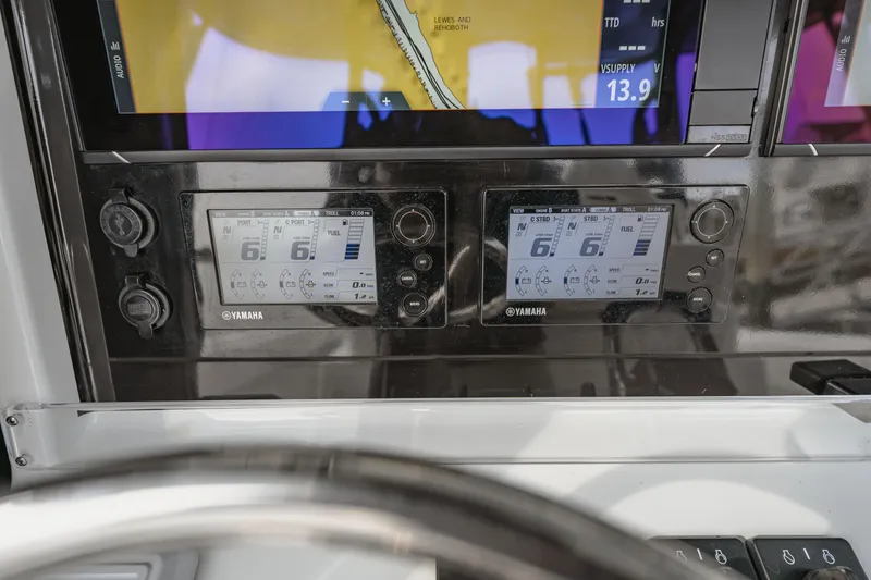 Slide: The Image of Dashboard of a 2018 Freeman 37 VH boat with Yamaha engine displays. - 23